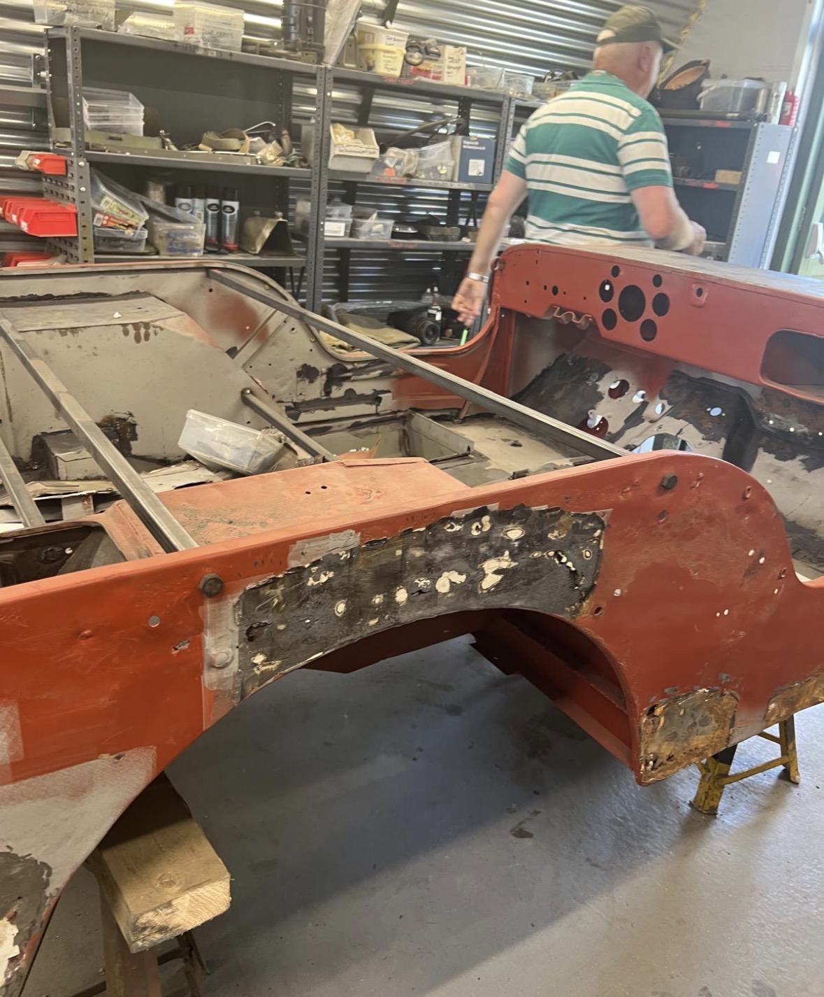 Original body panels awaiting corrosion treatment
